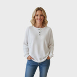 Helle | Vohvelineulosneule, jossa nappi