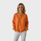 Helle | Vohvelineulosneule, jossa nappi